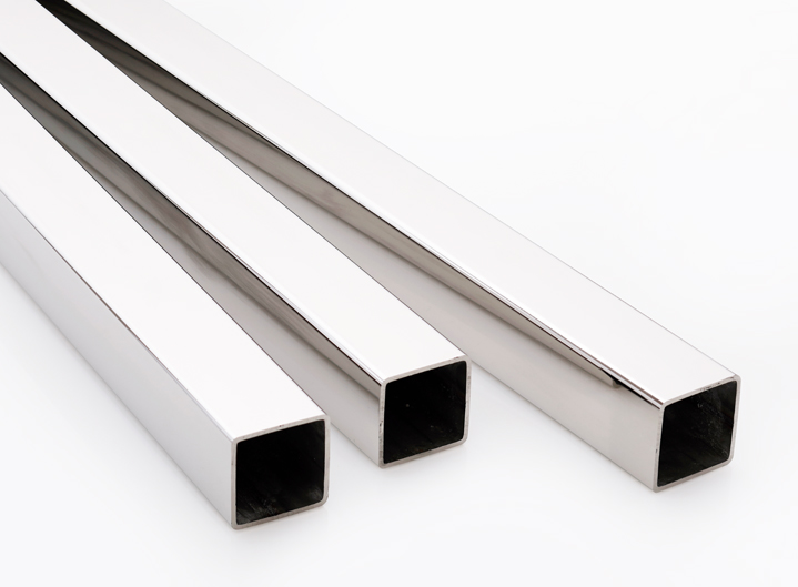 steel tubes and pipes on a white base